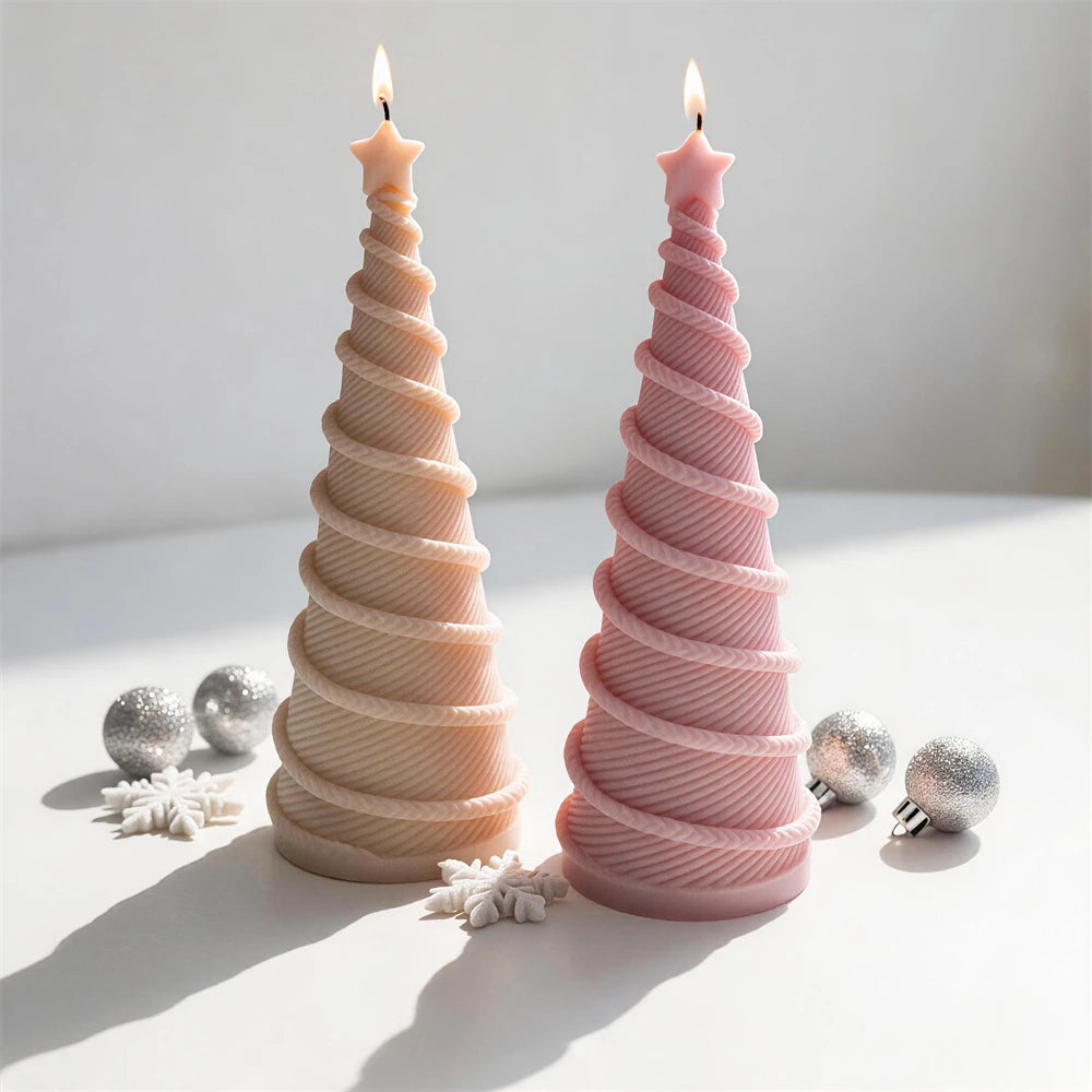 Tall Christmas tree candle with textured spiral wrapping and star topper