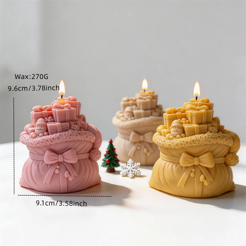 Santa present sack candle measuring 9.6 centimetres tall