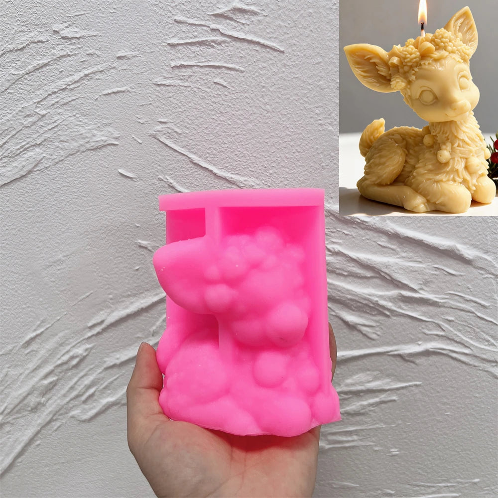 Pink silicone mold for creating a sitting reindeer candle