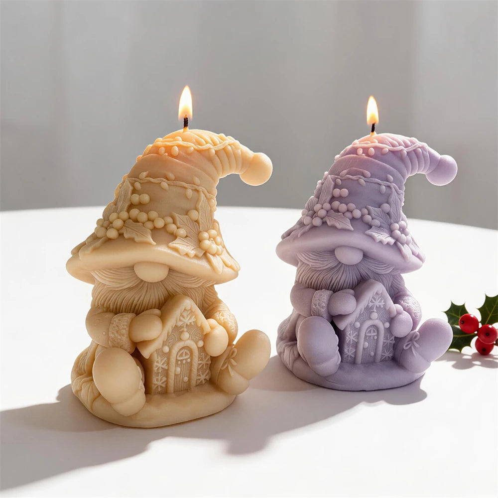 Festive gnome candles with snowflake house and berry decorations