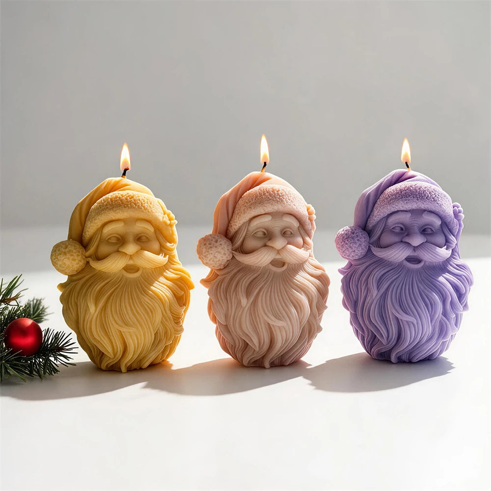 Santa Claus face candle with flowing beard and curled moustache