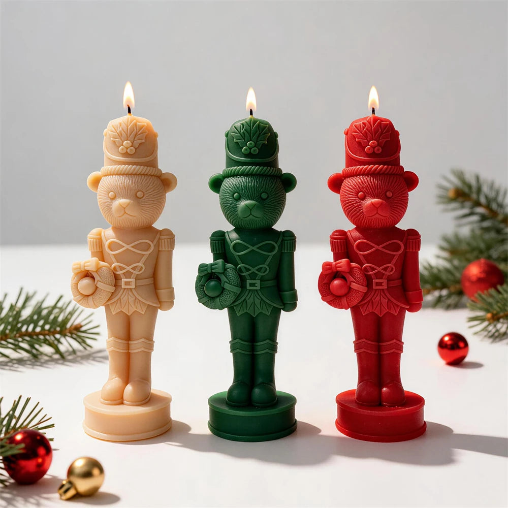 Bear nutcracker candles in cream, green and red wax