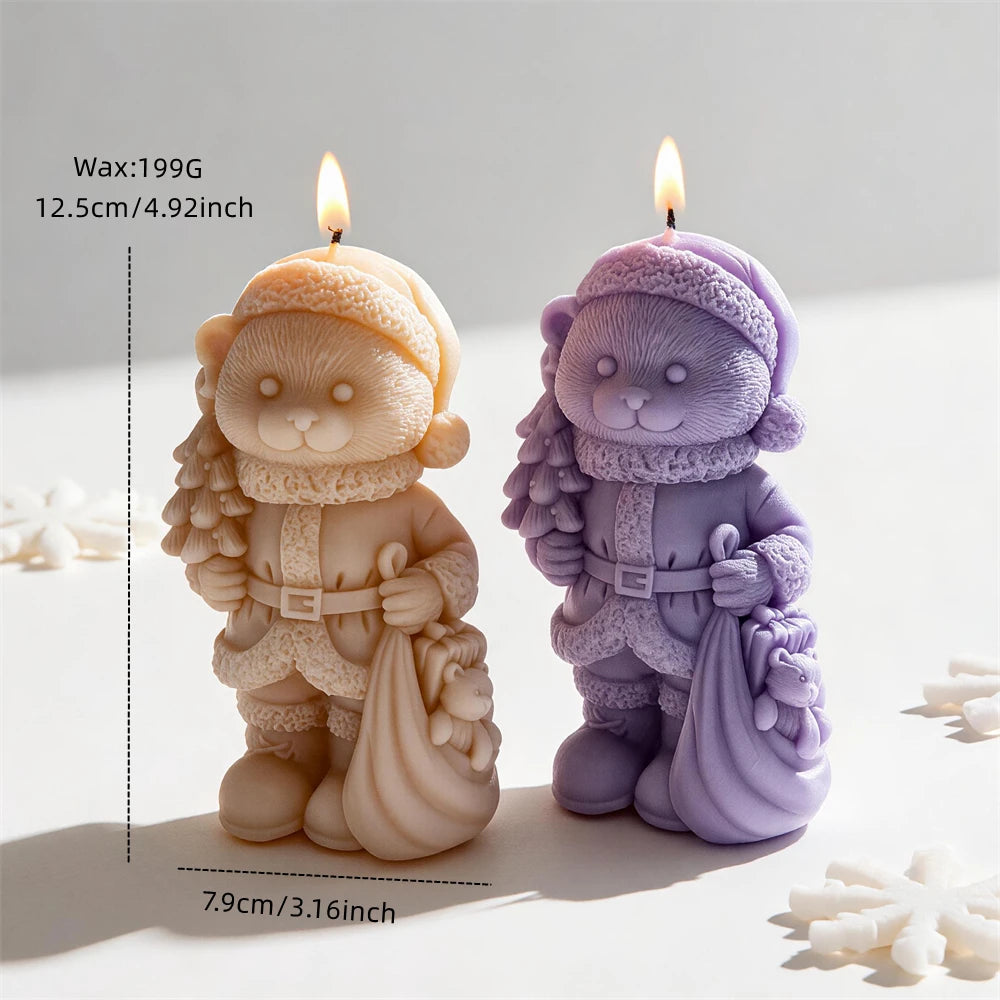 Christmas bear gift sack candle measuring 12.5 centimetres tall