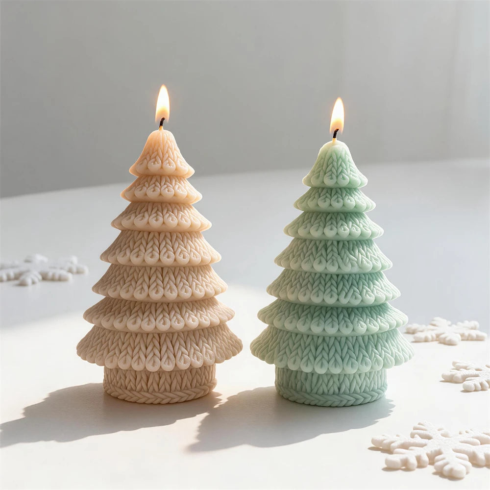 Pastel yarn-textured Christmas tree candles displayed with winter decorations