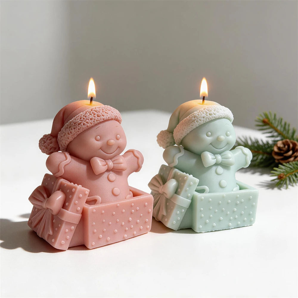 Gingerbread man gift box candles in pink, cream and mint green
