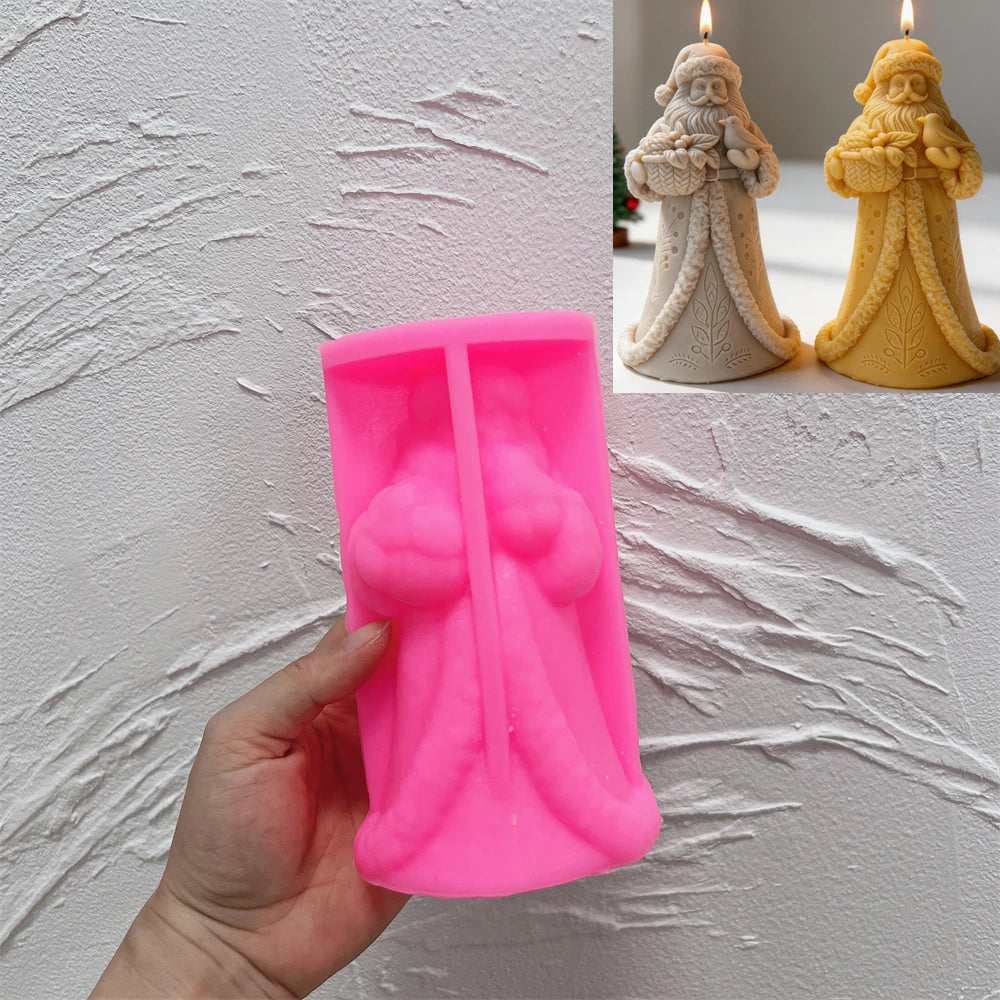 Pink silicone mold for creating a detailed Santa Claus candle
