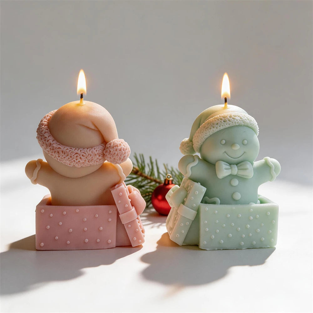 Gingerbread man gift box candles in pink, cream and mint green