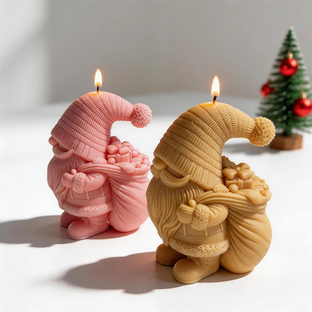 Christmas gnome candles carrying sacks filled with wrapped presents
