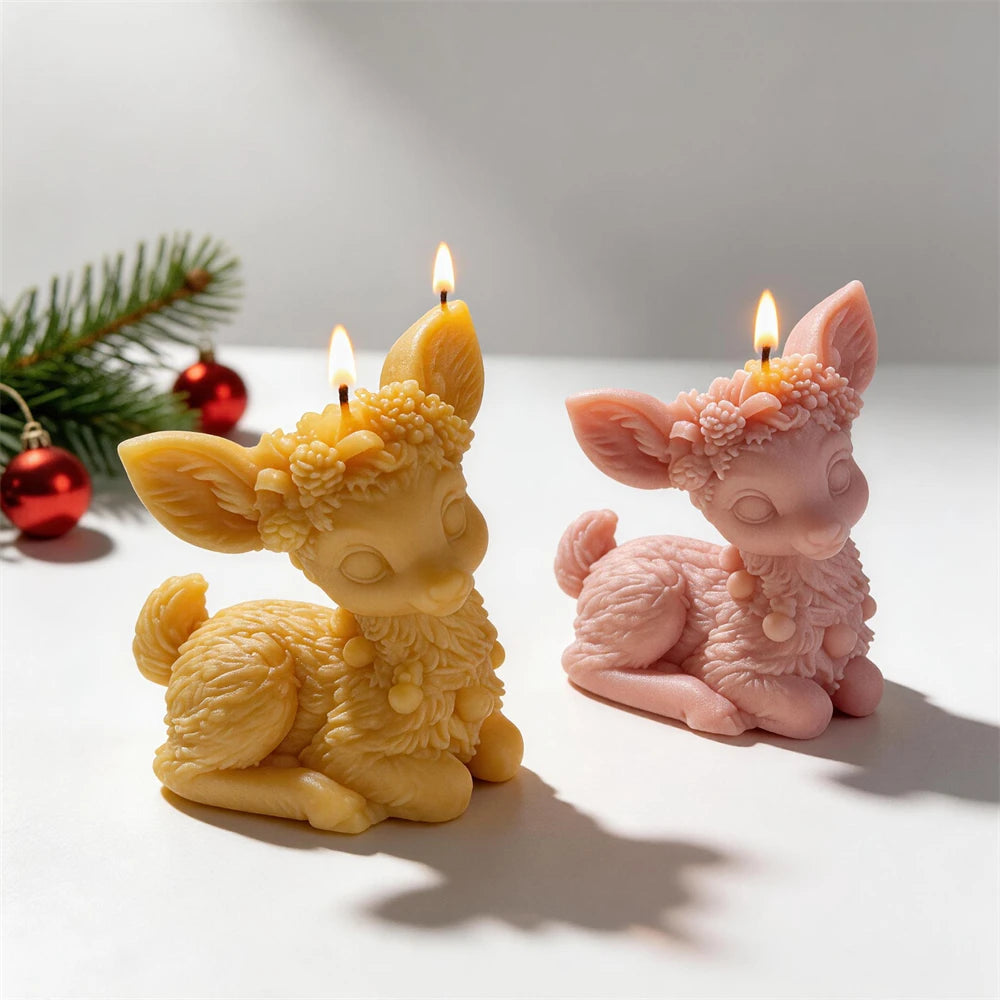 Floral crown sitting reindeer candles in cream, pink and golden wax