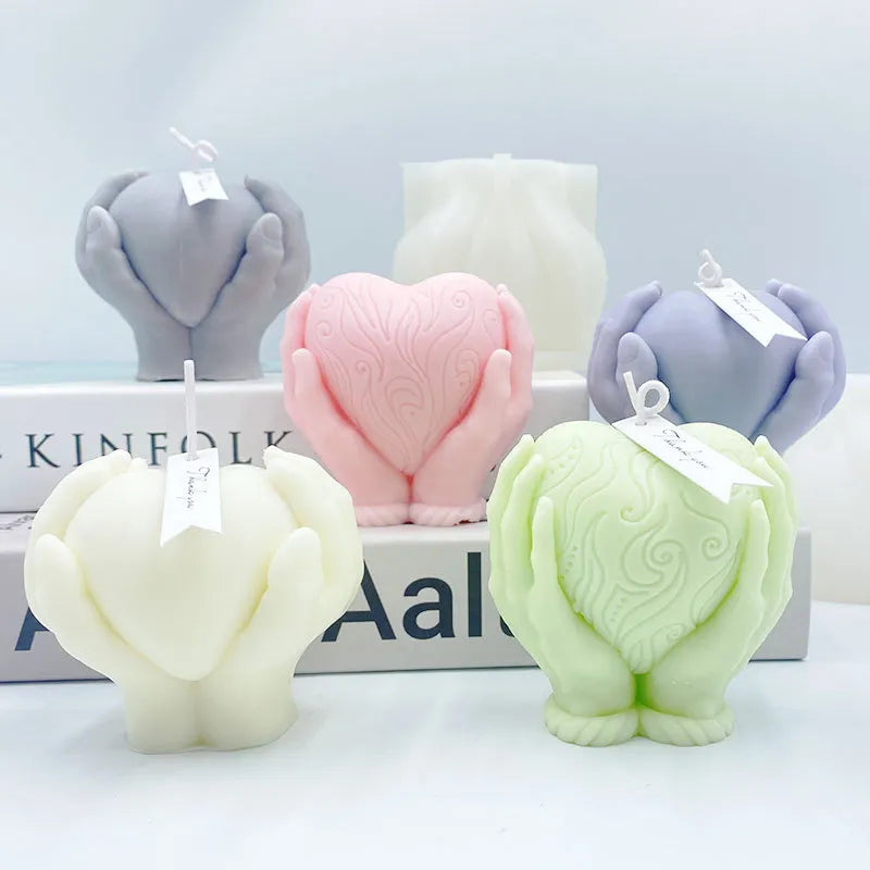 Hands Holding Heart Candle Mold