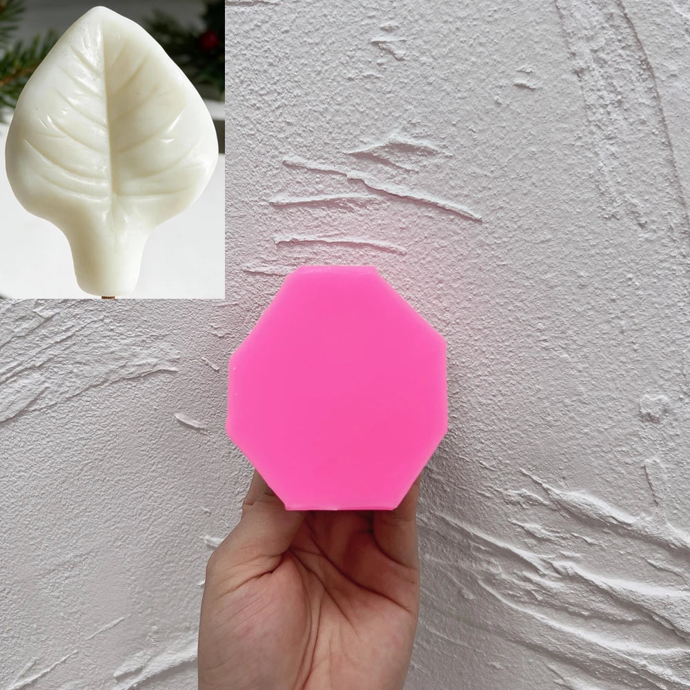 Botanical leaf candle with raised vein details made from silicone mold