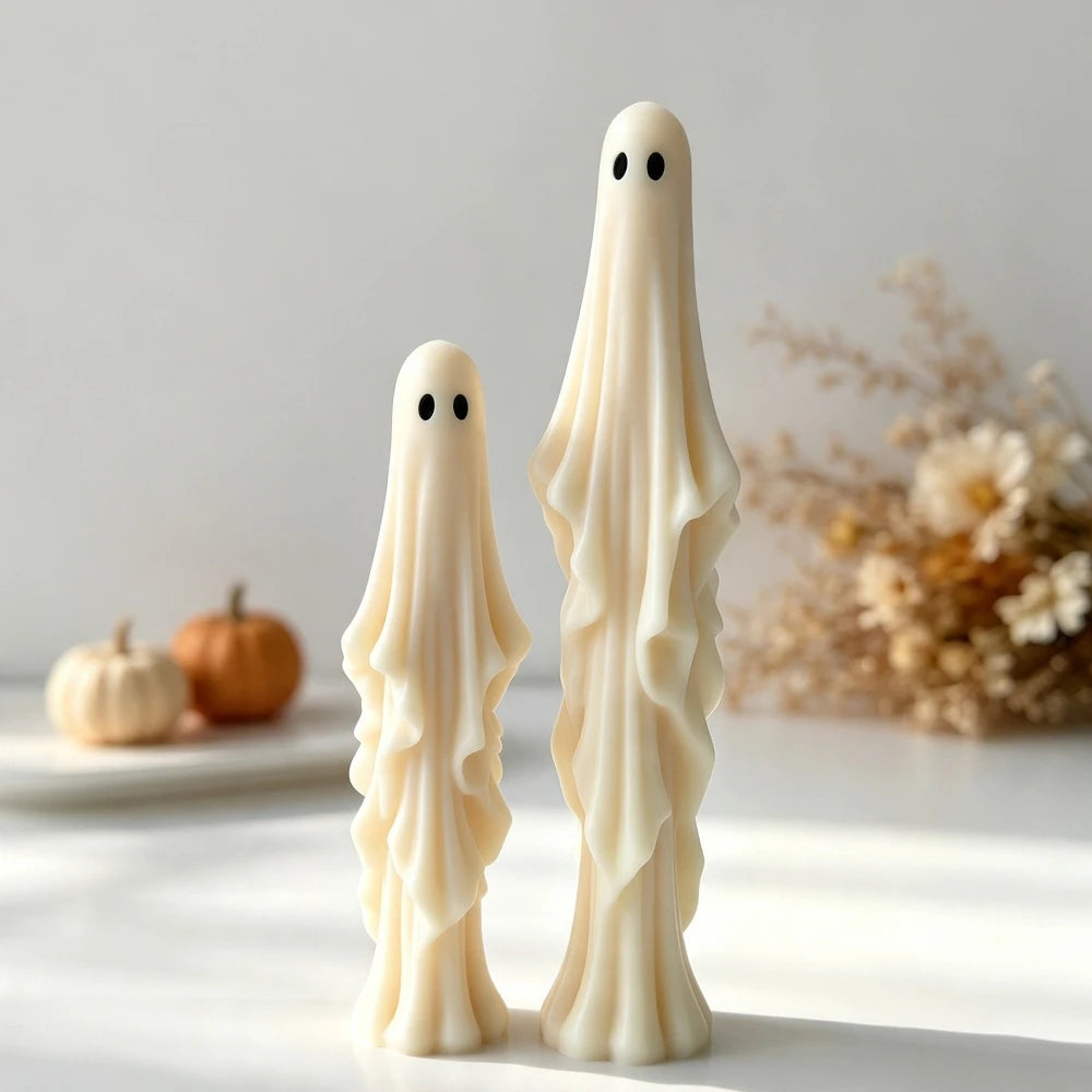 Small and large sheet ghost candles with cascading fabric texture