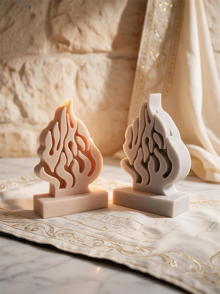 HaEsh Sheli flame candles in beige and gray on rectangular pedestal bases