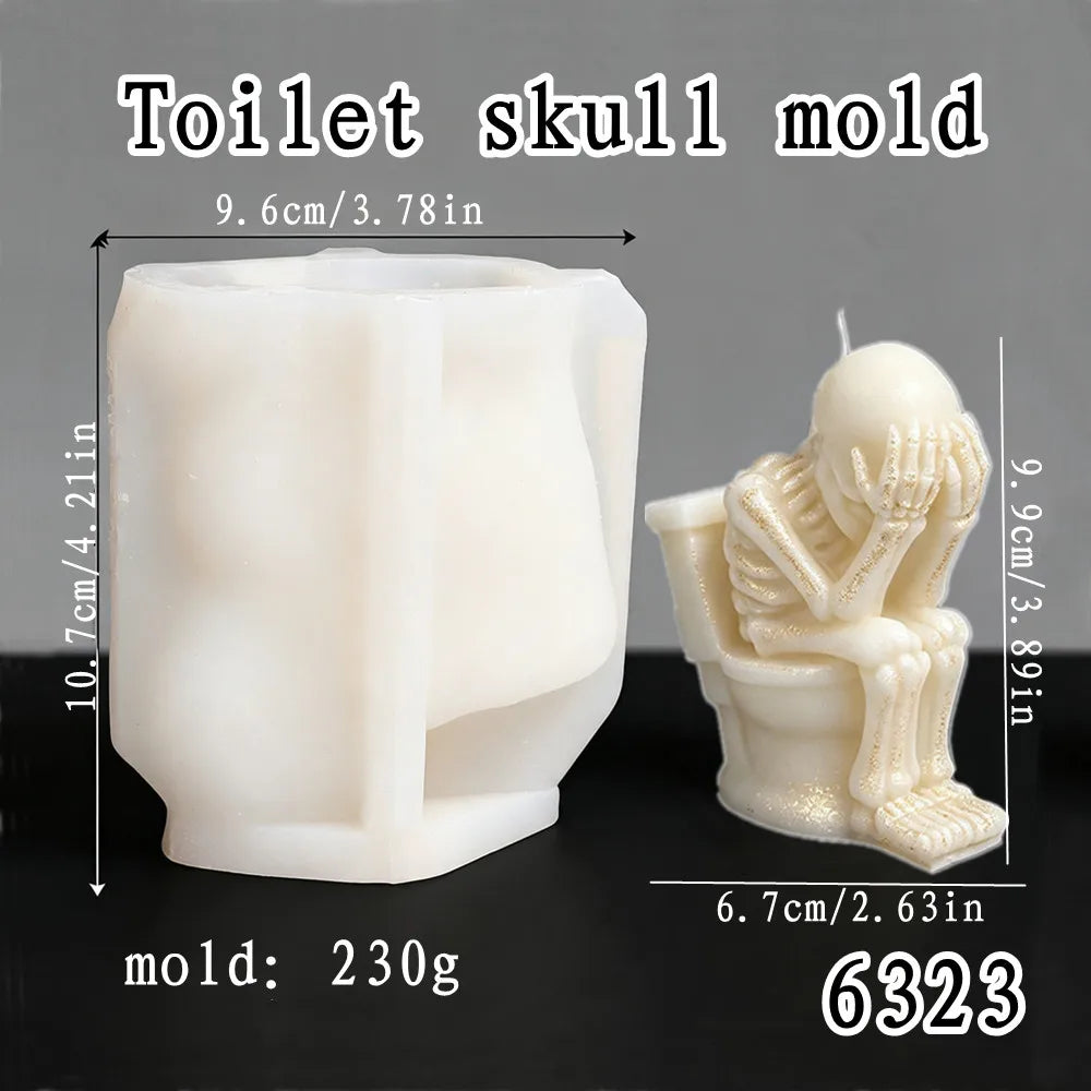 Skeleton sitting on toilet candle with hands covering its face