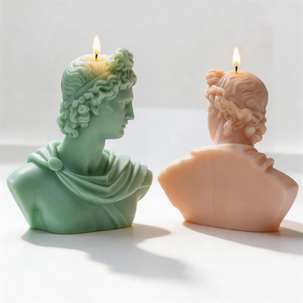 Apollo Greek statue silicone candle mold standing on a shelf.