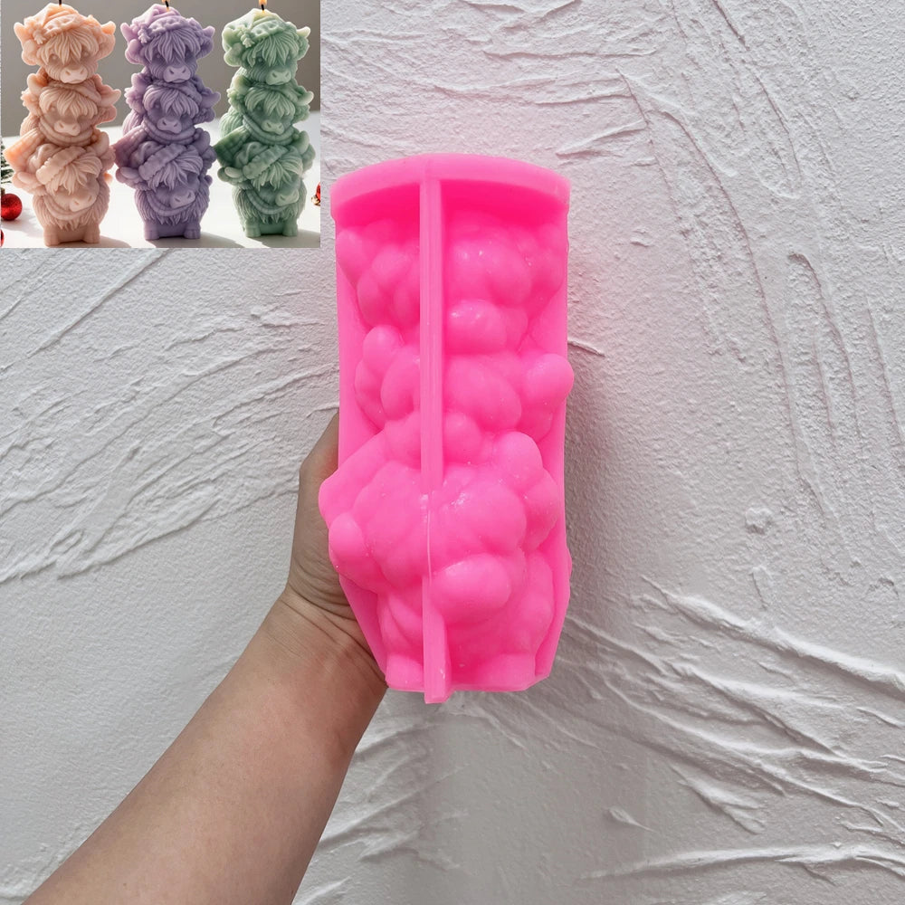 Stacked Highland cow trio silicone candle mold with detailed furry texture