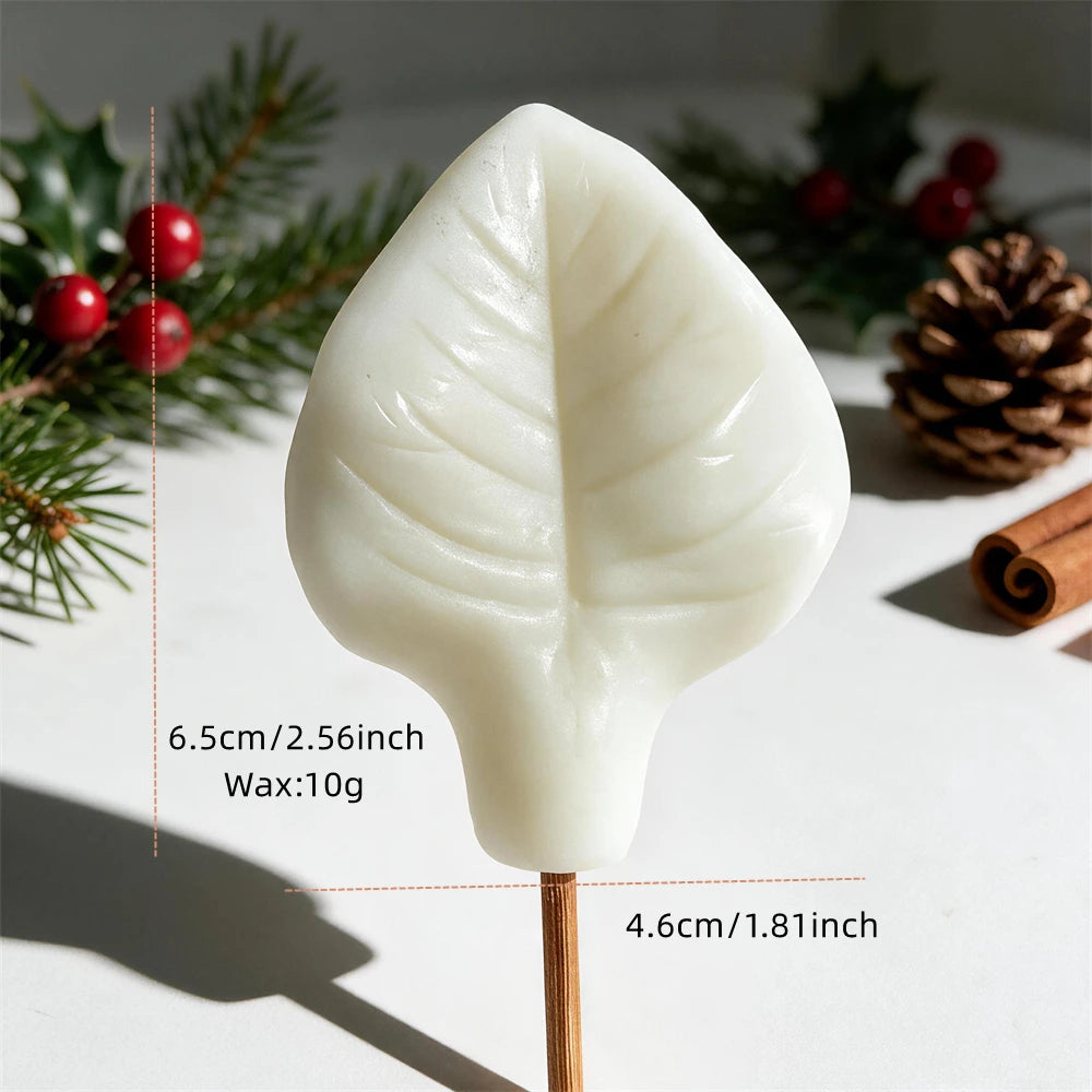 Botanical leaf candle with raised vein details made from silicone mold