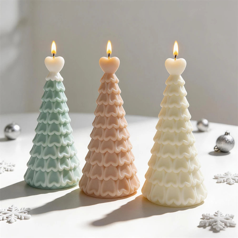 Heart-topped Christmas tree candles in green, beige and ivory wax