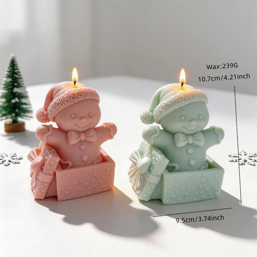 Gingerbread man gift box candle measuring 10.7 centimetres tall