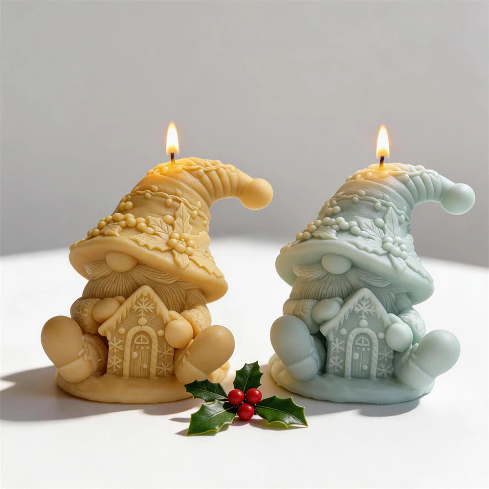 Festive gnome candles with snowflake house and berry decorations