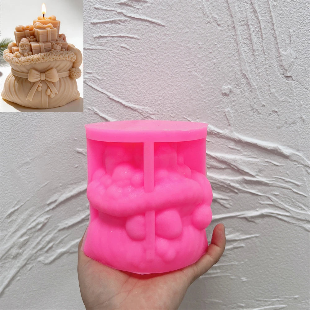 Pink silicone mold for creating a Christmas gift sack candle