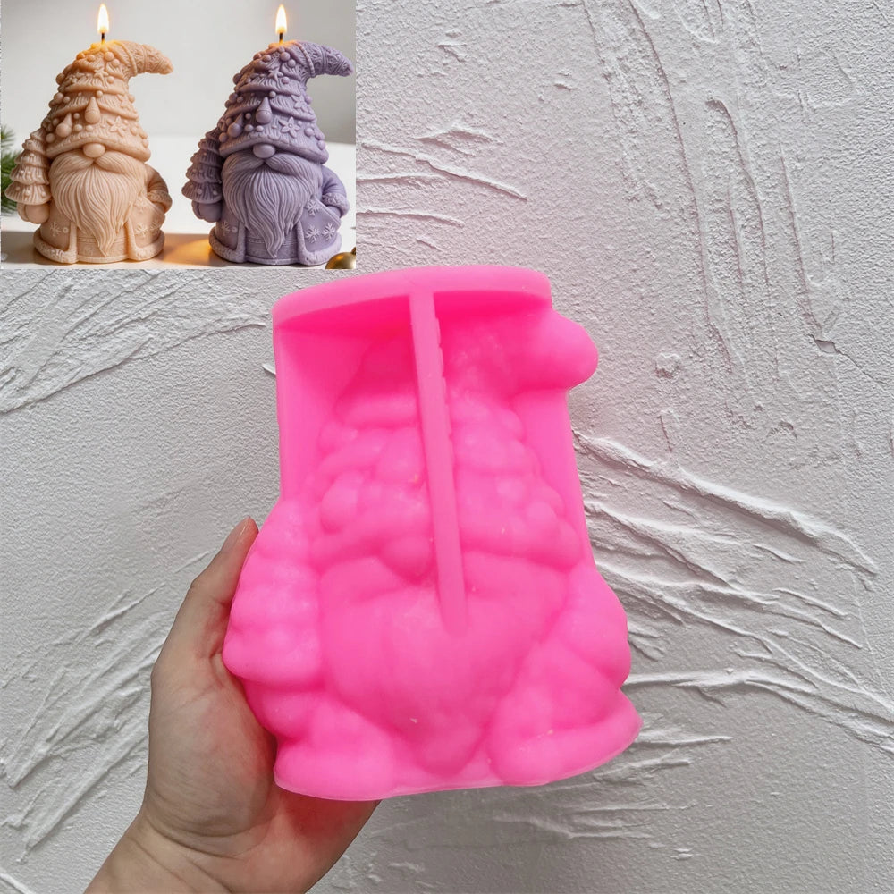 Pink silicone mold for creating a Christmas tree hat gnome candle