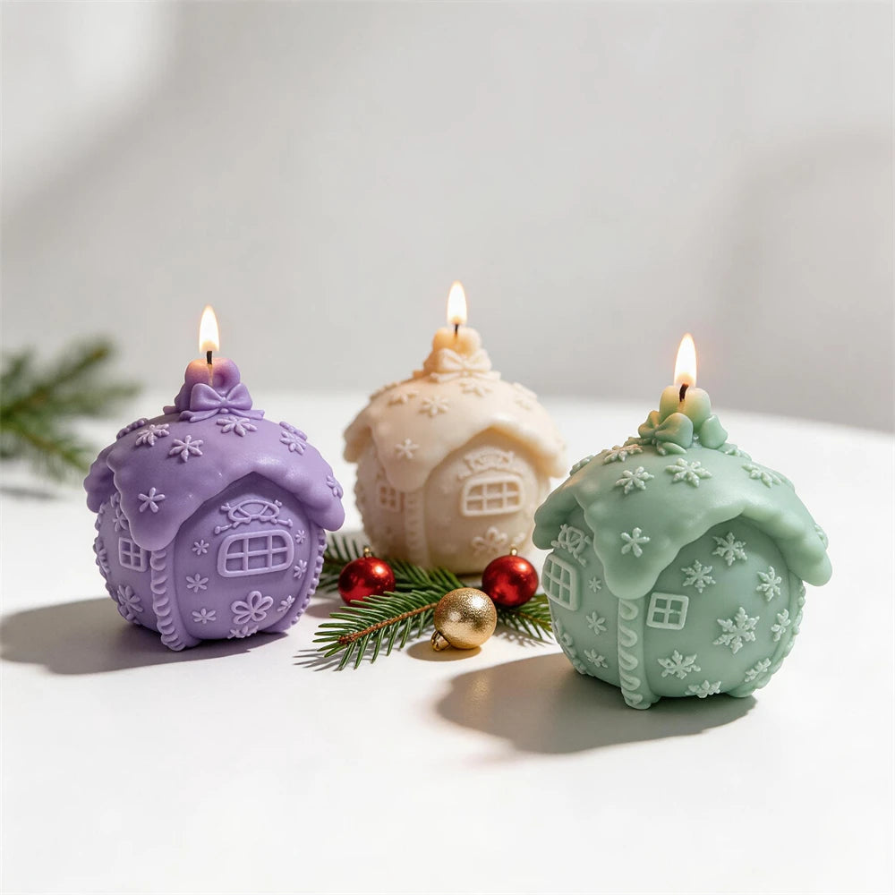 Snowy cottage Christmas ball candles in purple, cream and pastel green