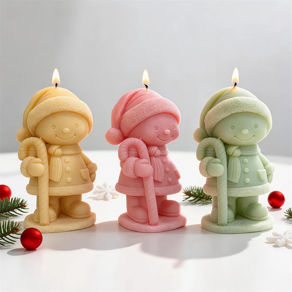 Candy cane winter child candles in cream, pink and mint green
