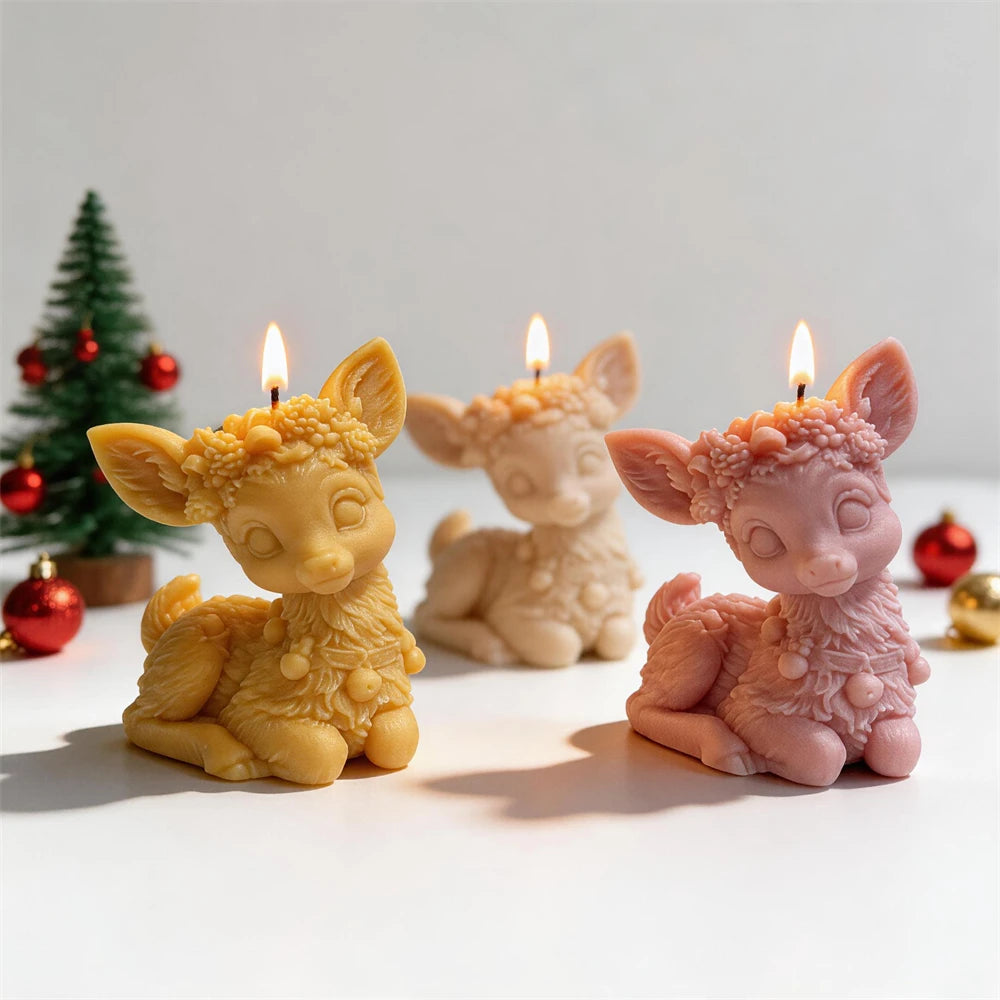 Floral crown sitting reindeer candles in cream, pink and golden wax