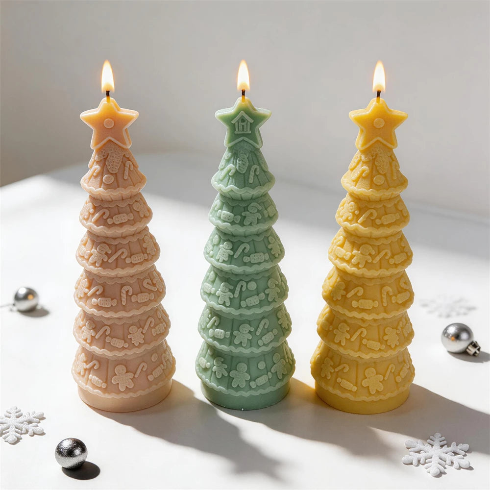 Tall Christmas tree candles decorated with gingerbread figures
