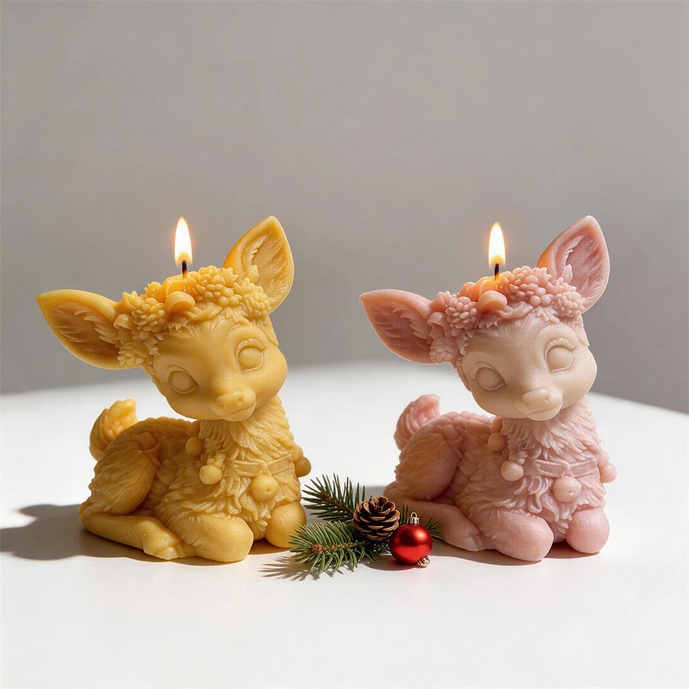 Floral crown sitting reindeer candles in cream, pink and golden wax