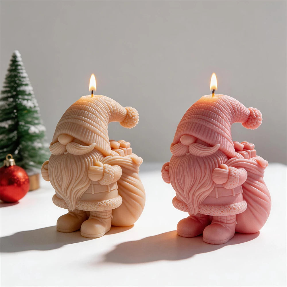 Festive gnome candles with pom-pom hats and present-filled sacks