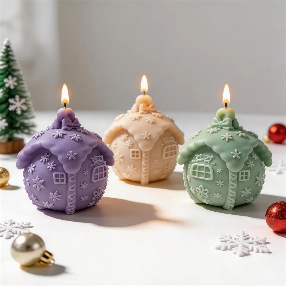 Snowy cottage Christmas ball candles in purple, cream and pastel green