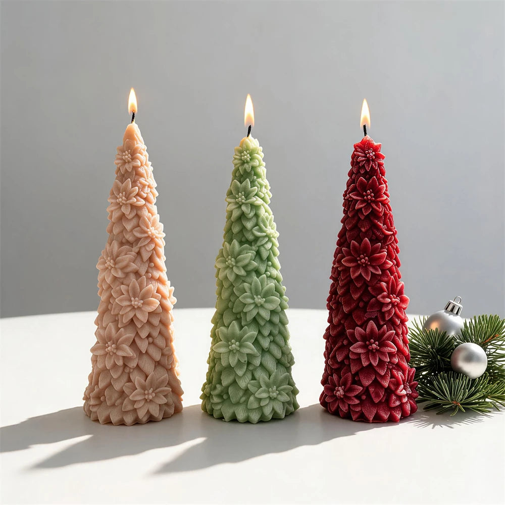 Red and green poinsettia Christmas tree candles with festive decorations
