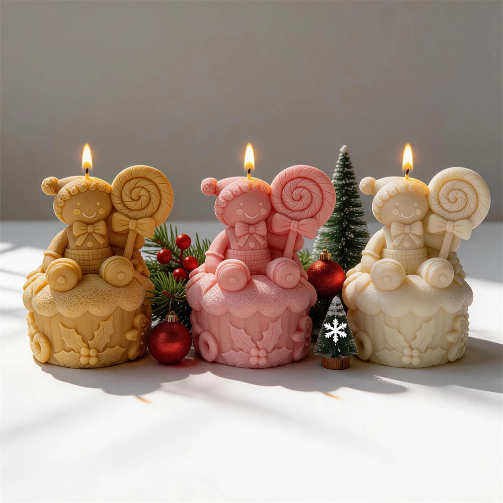Christmas gingerbread candle sitting on a decorated cake base