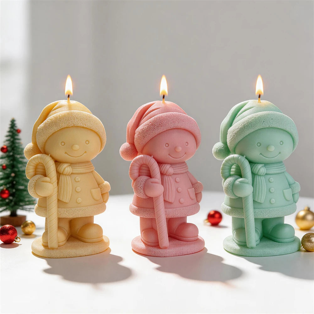 Candy cane winter child candles in cream, pink and mint green