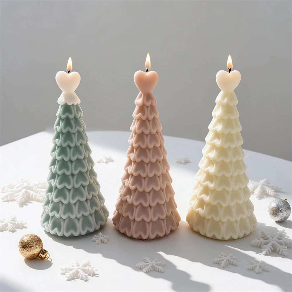 Heart-topped Christmas tree candles in green, beige and ivory wax