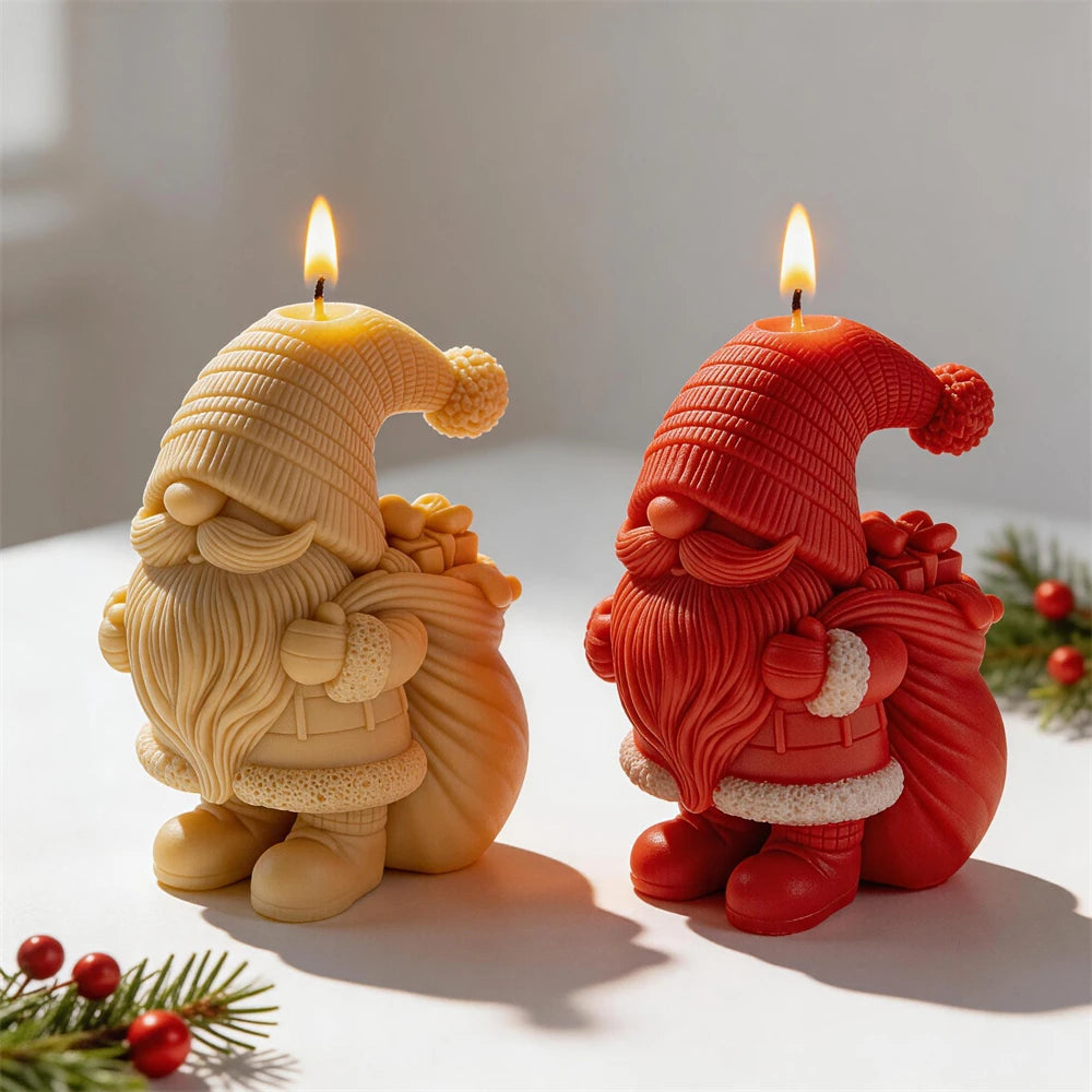 Christmas gnome candles carrying sacks filled with wrapped presents