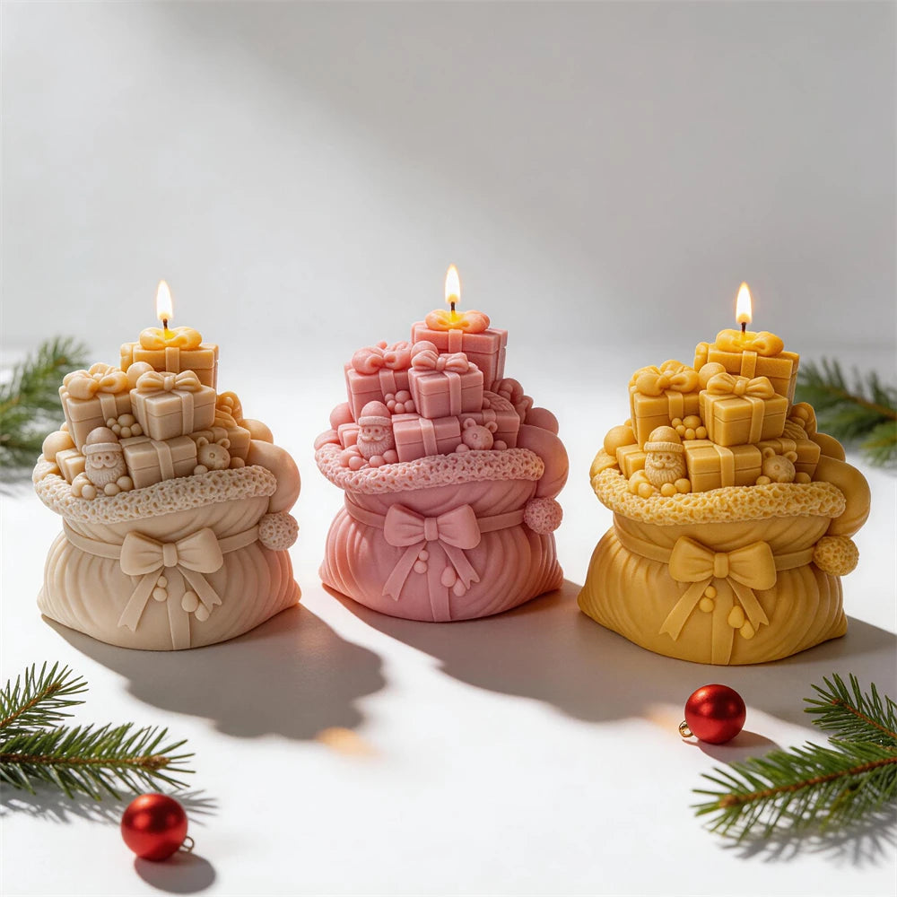 Christmas gift sack candle featuring stacked boxes and a decorative bow
