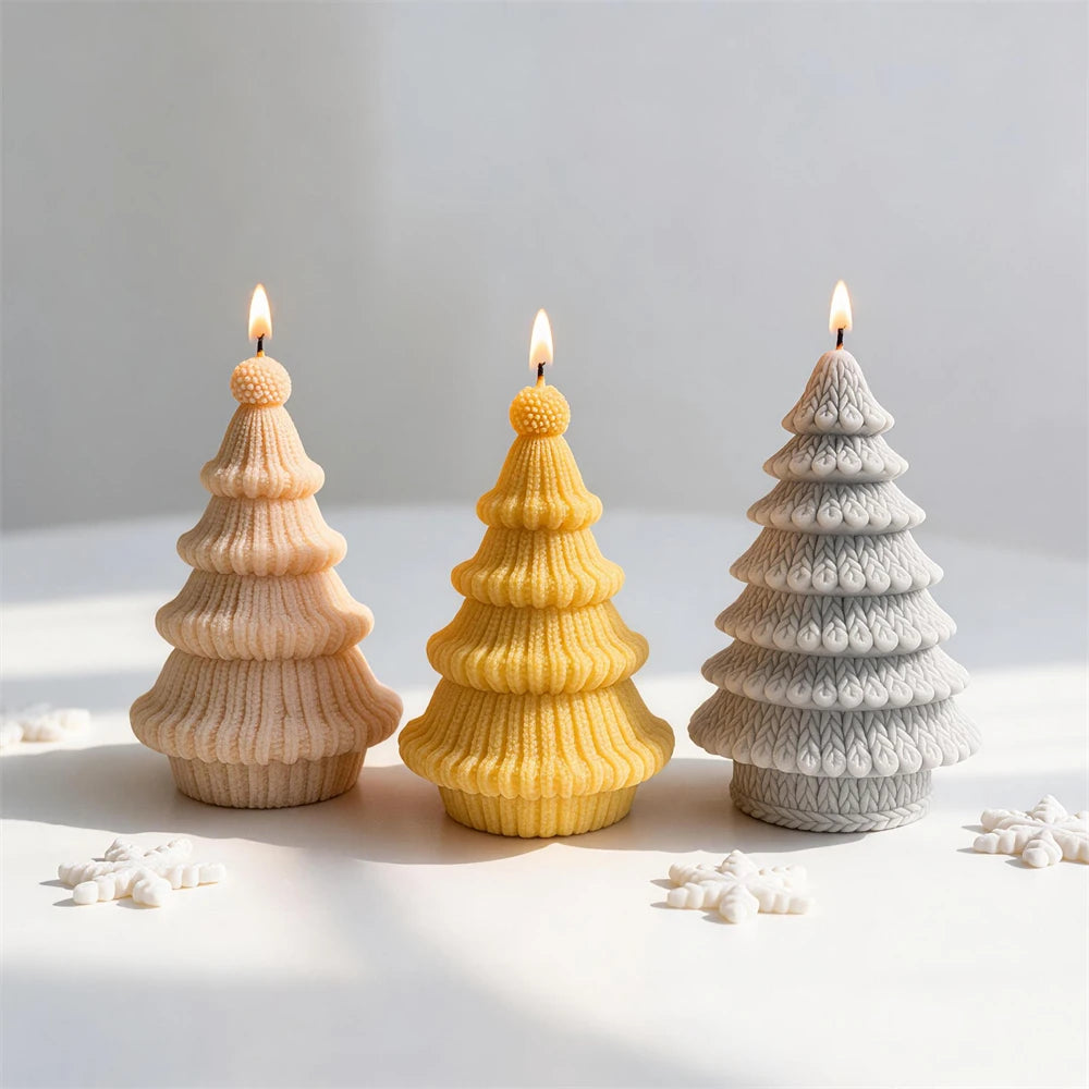 Knitted Christmas tree candles in leaf-stitch and ribbed yarn designs