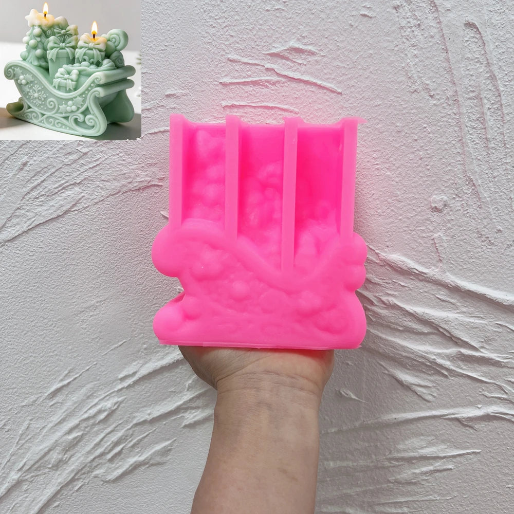 Christmas gift sleigh silicone candle mold with ornate scrollwork and presents