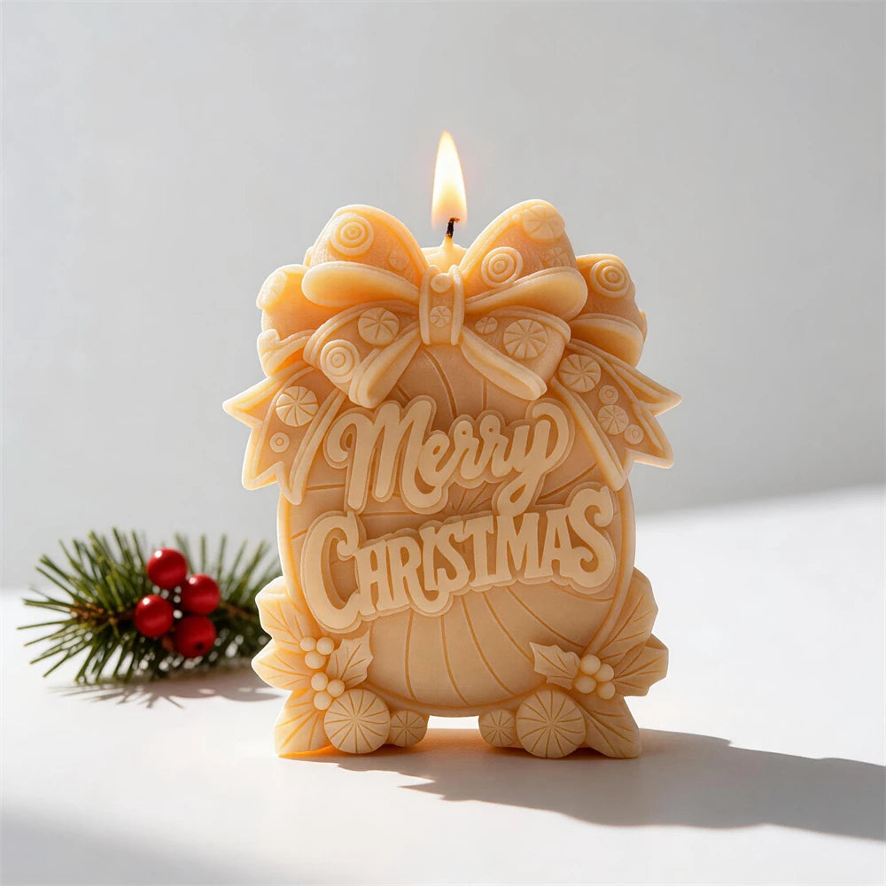 Christmas message candle with ribbed centre bow leaves and berries