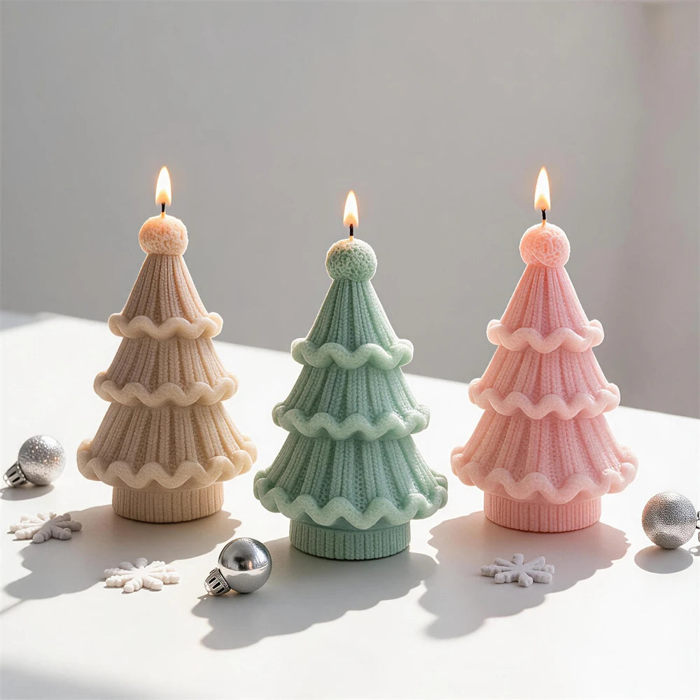 Ribbed knitted Christmas tree candles with round pom-pom toppers