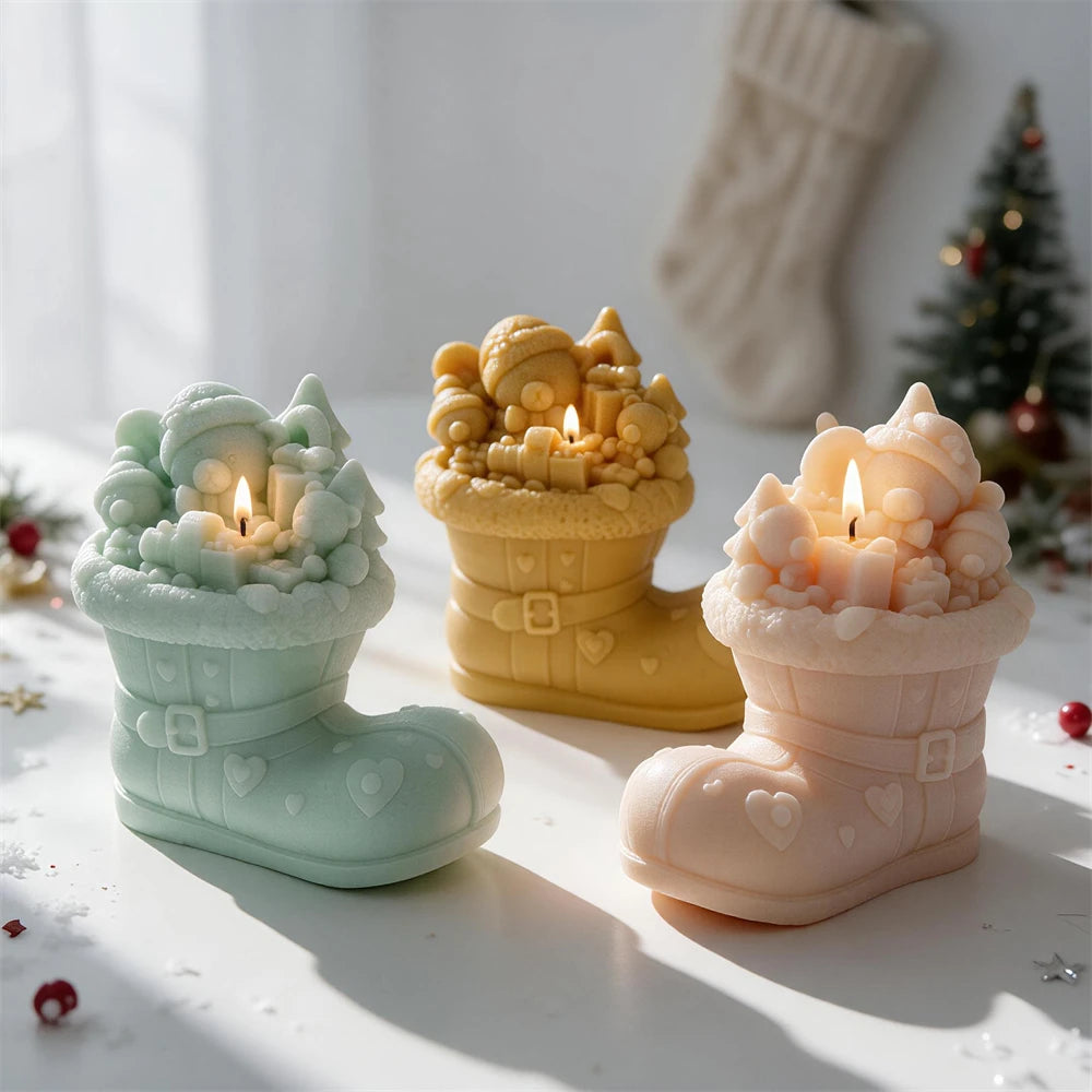 Teddy bear Christmas boot candle surrounded by presents and trees