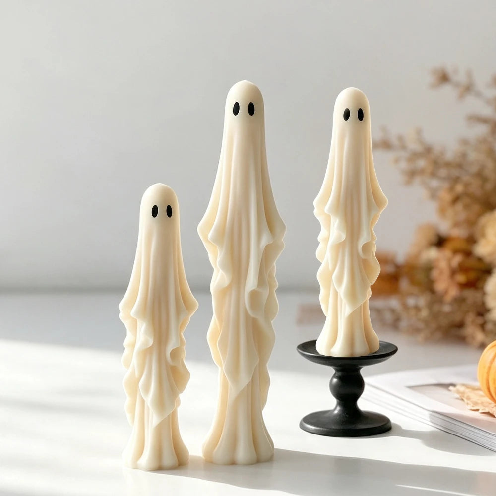 Tall draped ghost Halloween candles in two different sizes