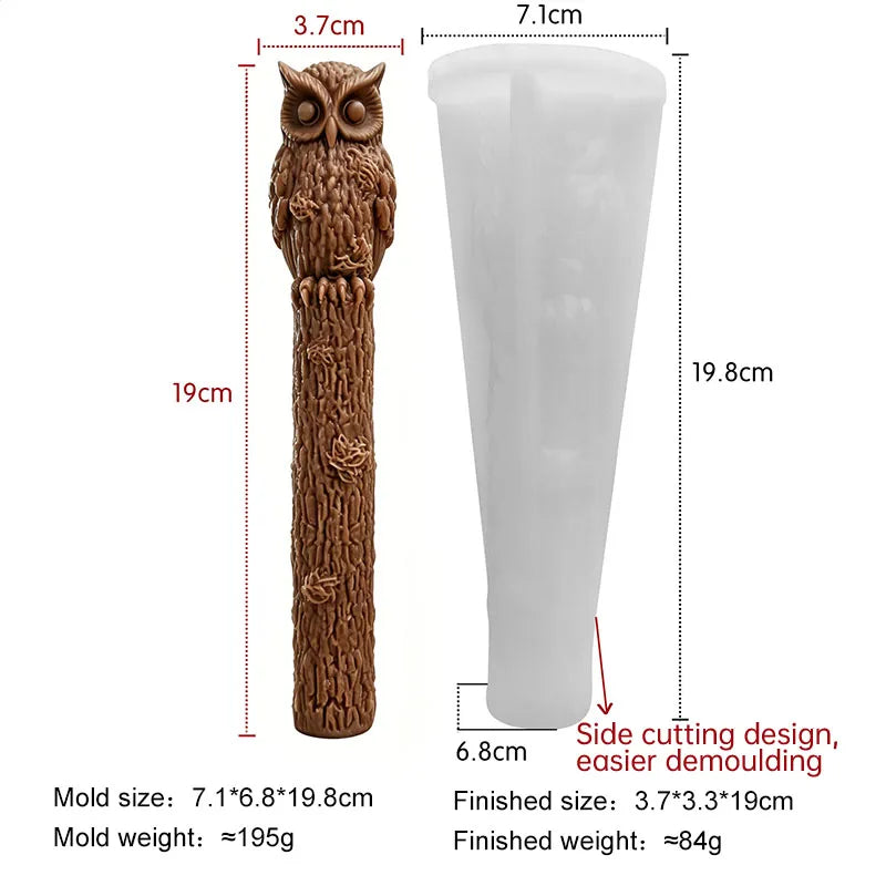Owl taper candle perched on detailed bark-textured tree trunk
