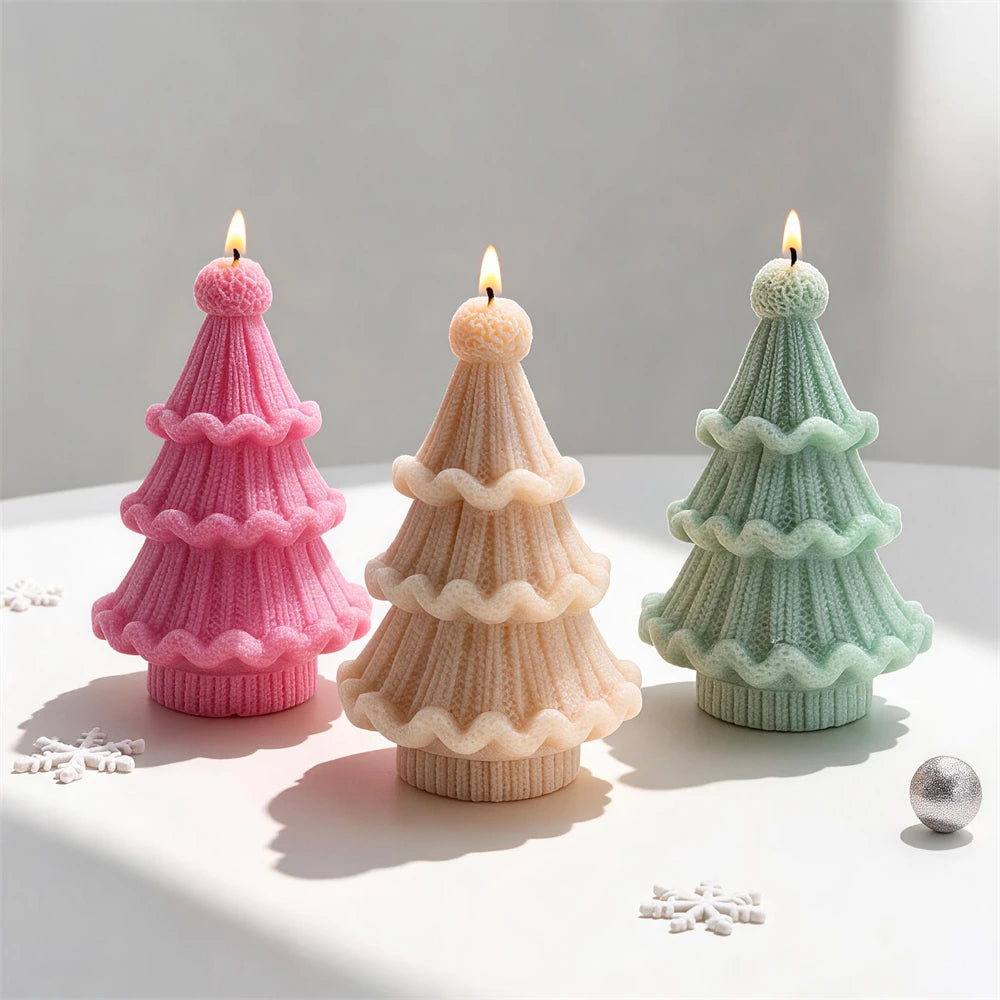 Ribbed knitted Christmas tree candles with round pom-pom toppers