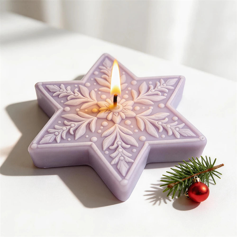 Decorative winter star candle with embossed snowflake pattern