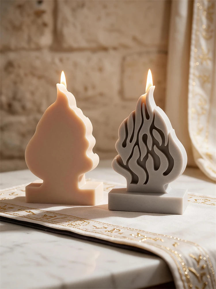 HaEsh Sheli flame candles in beige and gray on rectangular pedestal bases