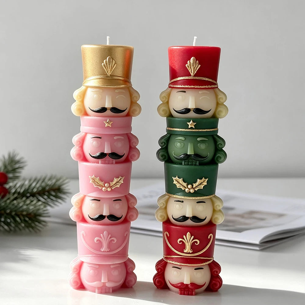 Pink and red-green multicoloured stacked nutcracker soldier candle samples with four figures arranged vertically